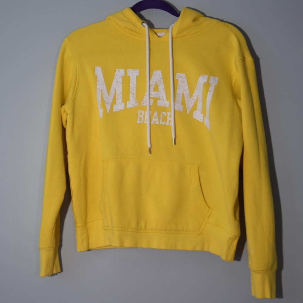 Yellow Miami hoodie with white strings/toggles